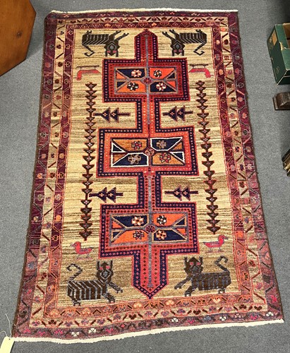 Lot 453 - A Caucasian rug, with three central medallions...