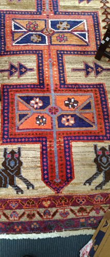Lot 453 - A Caucasian rug, with three central medallions...