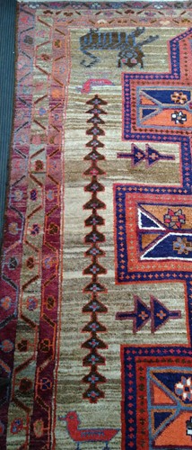 Lot 453 - A Caucasian rug, with three central medallions...