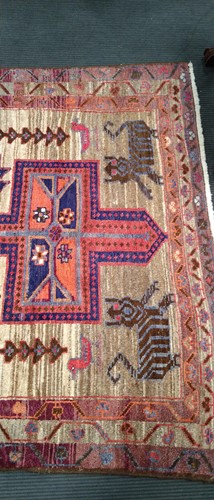 Lot 453 - A Caucasian rug, with three central medallions...