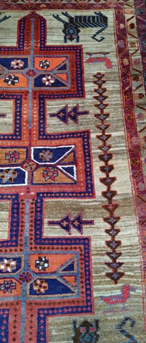Lot 453 - A Caucasian rug, with three central medallions...