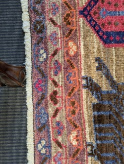 Lot 453 - A Caucasian rug, with three central medallions...