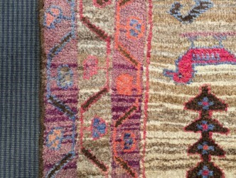 Lot 453 - A Caucasian rug, with three central medallions...