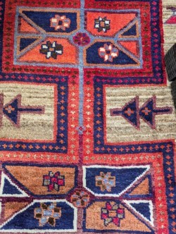 Lot 453 - A Caucasian rug, with three central medallions...