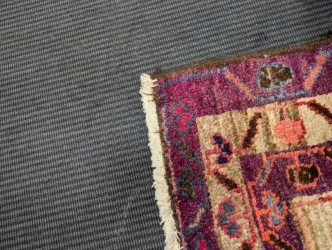 Lot 453 - A Caucasian rug, with three central medallions...