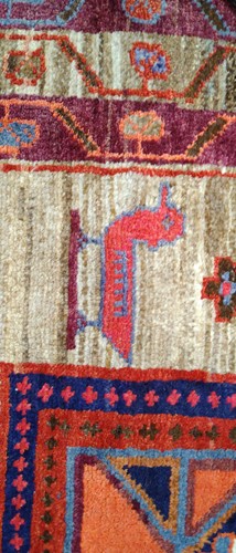 Lot 453 - A Caucasian rug, with three central medallions...
