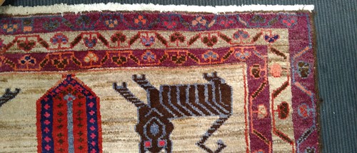 Lot 453 - A Caucasian rug, with three central medallions...
