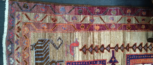 Lot 453 - A Caucasian rug, with three central medallions...