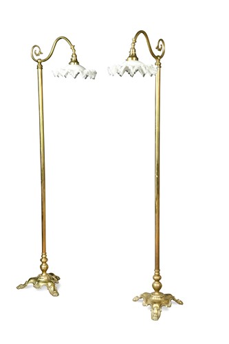 Lot 422 - A pair of Art Nouveau brass standard lamps