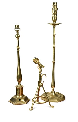 Lot 570 - An Arts & Crafts brass table or wall lamp, circa 1905