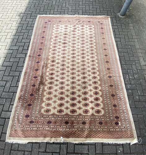 Lot 464 - A modern Bokhara style carpet, with multiple...