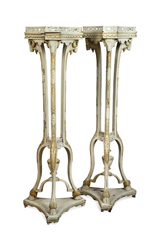 Lot 544 - A pair of white and gilt painted Adam style torcheres, late 19th century