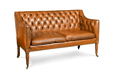 Lot 405 - A leather two seater sofa in the manner of Gillows, 19th century