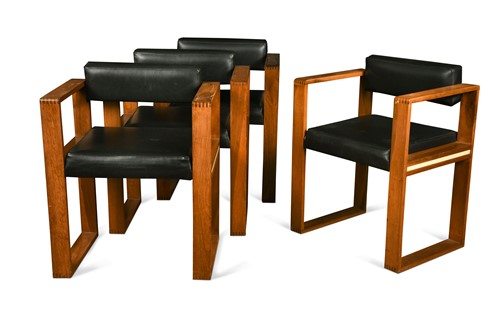Lot 353 - In the manner of Ate van Apeldoorn, a set of four mahogany framed elbow chairs, circa 1970