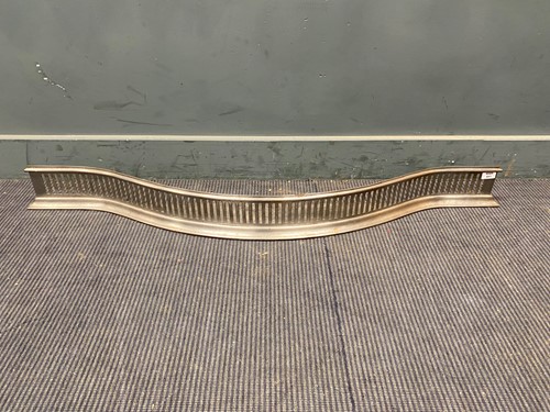 Lot 441 - A George III serpentine steel fender 135cm wide