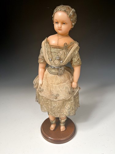 Lot 48 - A Pierotti poured wax shoulder head 'fairy' doll, English, circa 1850