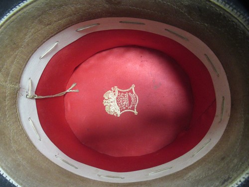 Lot 23 - A large silk top hat in leather case Internal...