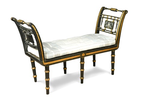 Lot 541 - A Regency ebonised and parcel gilt window seat