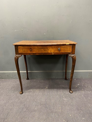 Lot 669 - George II walnut side table or low boy on pad...