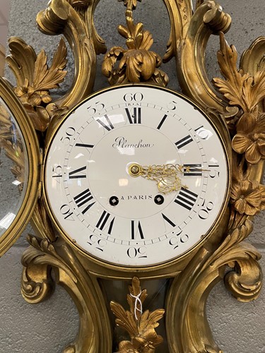 Lot 542 - A French ormolu cartel clock by Planchon a Paris, 19th century
