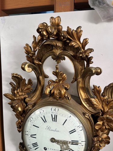Lot 542 - A French ormolu cartel clock by Planchon a Paris, 19th century