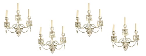 Lot 520 - A set of four cut-glass wall lights, early 20th century