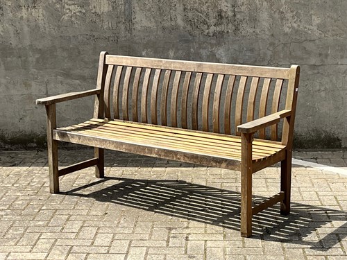 Lot 418 - A modern 3 seater garden bench by Bridgman...