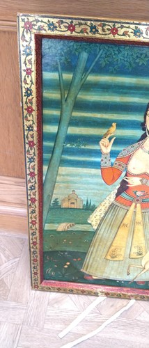 Lot 89 - A Qajar School painting of a lady in a landscape