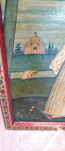 Lot 89 - A Qajar School painting of a lady in a landscape