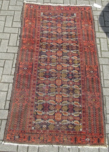 Lot 459 - An Afgan rug 193 x 103cm