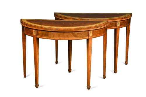 Lot 457 - A pair of George III mahogany and inlaid demi lune card tables