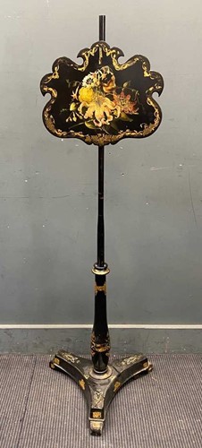 Lot 747 - A Victorian ebonised pole screen with floral...
