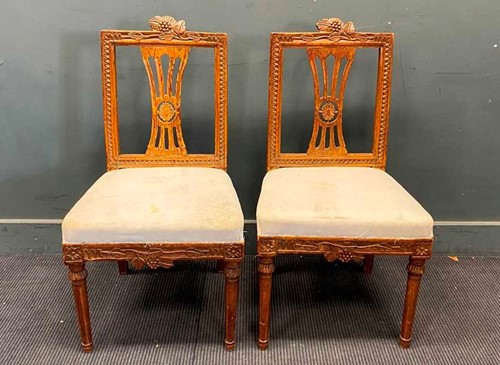 Lot 748 - A pair of Scandinavian pine side chairs and...