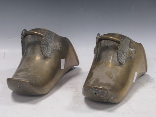 Lot 8 - A pair of brass stirrups, probably South American