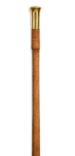 Lot 608 - An 18ct gold mounted leather clad walking cane by Brigg, early 20th century