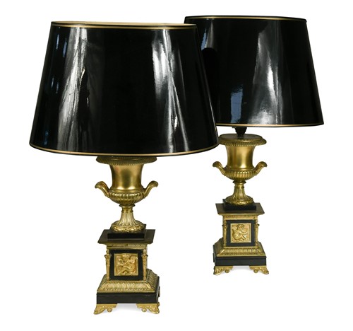 Lot 529 - A pair of Empire-style gilt and black painted metal table lamps