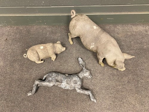 Lot 839 - A model lead sow, 51cm, a reclining pig, and...