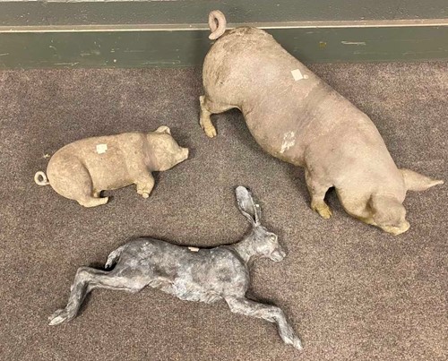 Lot 839 - A model lead sow, 51cm, a reclining pig, and...