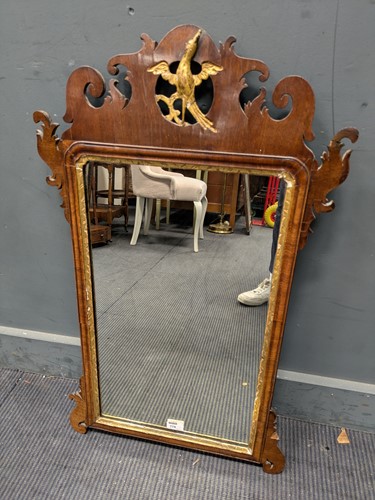 Lot 778 - An 18th century style walnut fret framed wall...