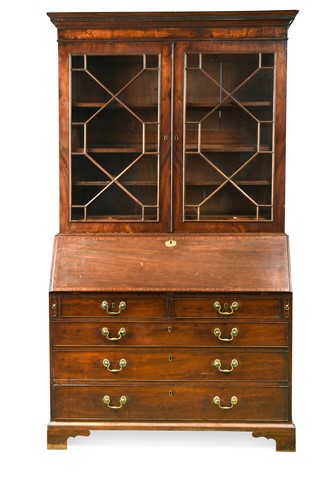 Lot 413 - A late George III mahogany bureau bookcase