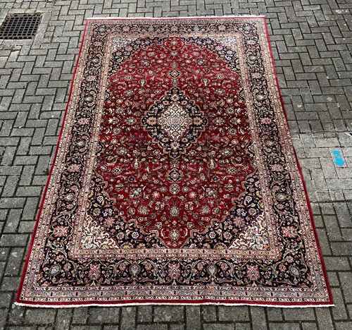Lot 858 - A modern Tabriz type rug, with central...