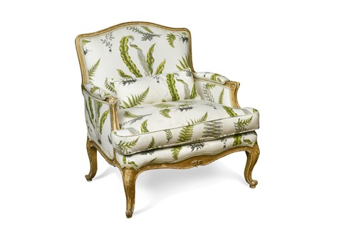 Lot 390 - A French Louis XV style bergere armchair, 20th century