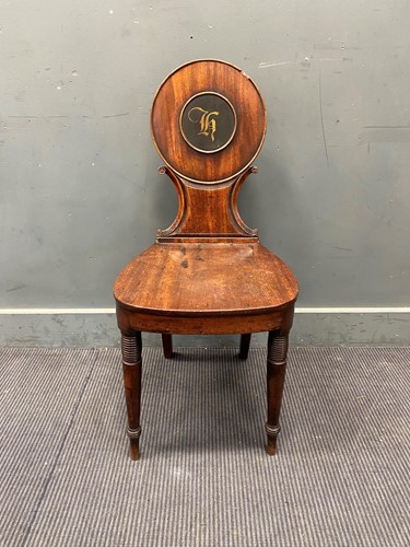 Lot 651 - Regency mahogany hall chair, the round...