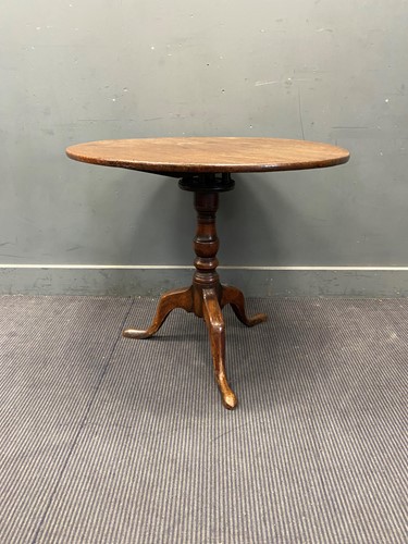 Lot 648 - A George III mahogany tripod table, set on...