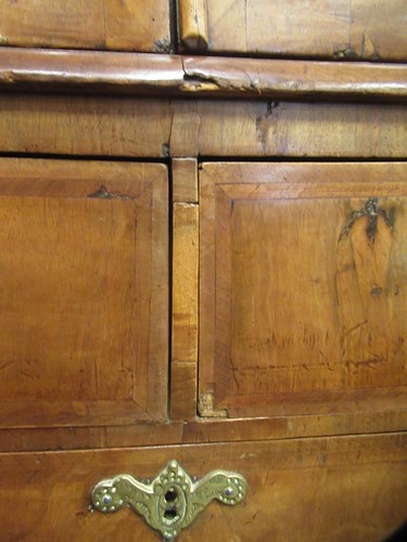 Lot 711 - A William & Mary walnut feather banded cabinet on chest, late 17th century