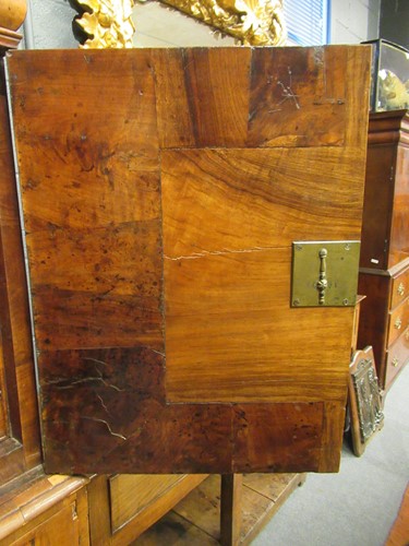 Lot 711 - A William & Mary walnut feather banded cabinet on chest, late 17th century