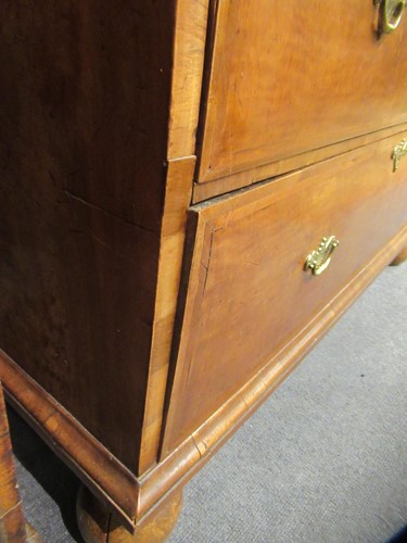 Lot 711 - A William & Mary walnut feather banded cabinet on chest, late 17th century