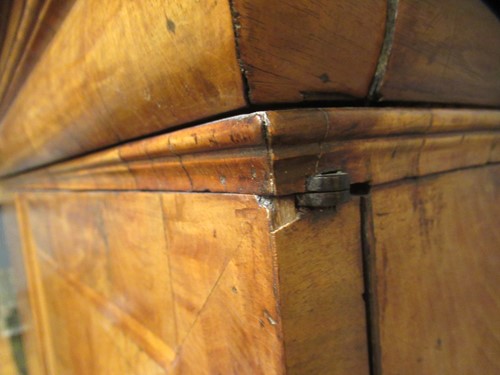 Lot 711 - A William & Mary walnut feather banded cabinet on chest, late 17th century