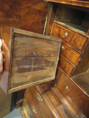 Lot 711 - A William & Mary walnut feather banded cabinet on chest, late 17th century