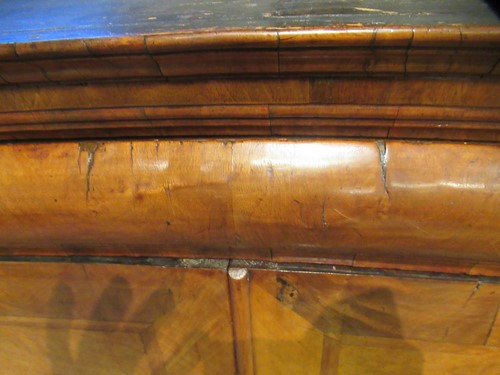 Lot 711 - A William & Mary walnut feather banded cabinet on chest, late 17th century